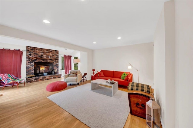13 Romar Ave, White Plains, NY 10605 - living area with wood finished floors, recessed lighting, and a fireplace