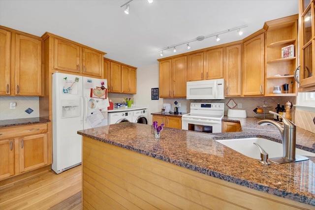13 Romar Ave, White Plains, NY 10605 - kitchen featuring white appliances, a sink, dark stone countertops, independent washer and dryer, and backsplash