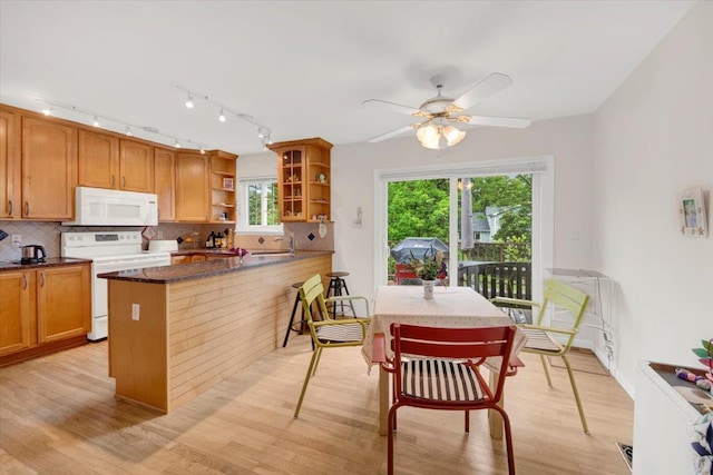 13 Romar Ave, White Plains, NY 10605 - kitchen with white appliances, open shelves, backsplash, and light wood-style floors
