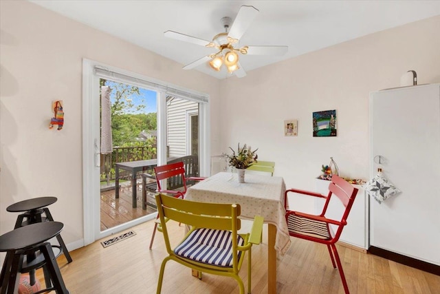 13 Romar Ave, White Plains, NY 10605 - dining area featuring baseboards, light wood finished floors, and a ceiling fan