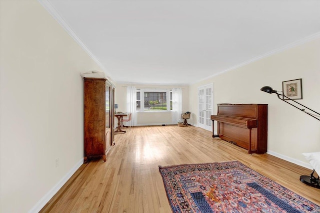13 Romar Ave, White Plains, NY 10605 - living area with baseboards, ornamental molding, and light wood finished floors