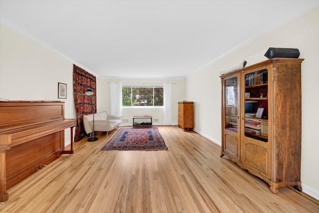 13 Romar Ave, White Plains, NY 10605 - sitting room featuring light wood-style floors, crown molding, and baseboards