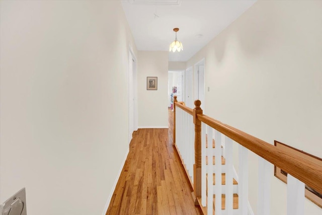 13 Romar Ave, White Plains, NY 10605 - hall featuring light wood-style floors, an upstairs landing, and baseboards