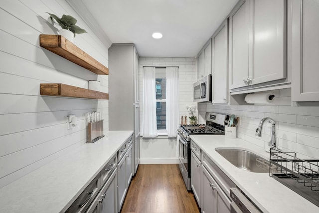 1 Vincent Rd Unit 2B, Bronxville, NY 10708 - kitchen with appliances with stainless steel finishes, open shelves, gray cabinetry, a sink, and dark wood-style flooring