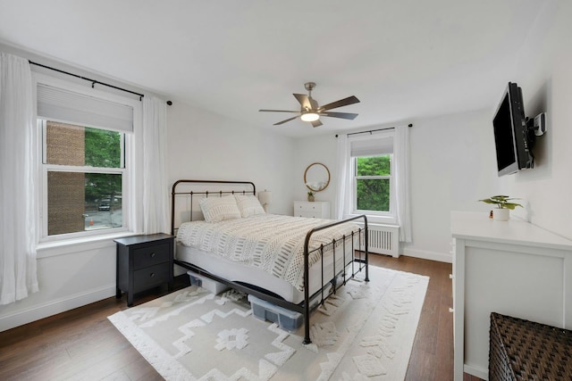 1 Vincent Rd Unit 2B, Bronxville, NY 10708 - bedroom featuring wood finished floors, baseboards, radiator, and a ceiling fan