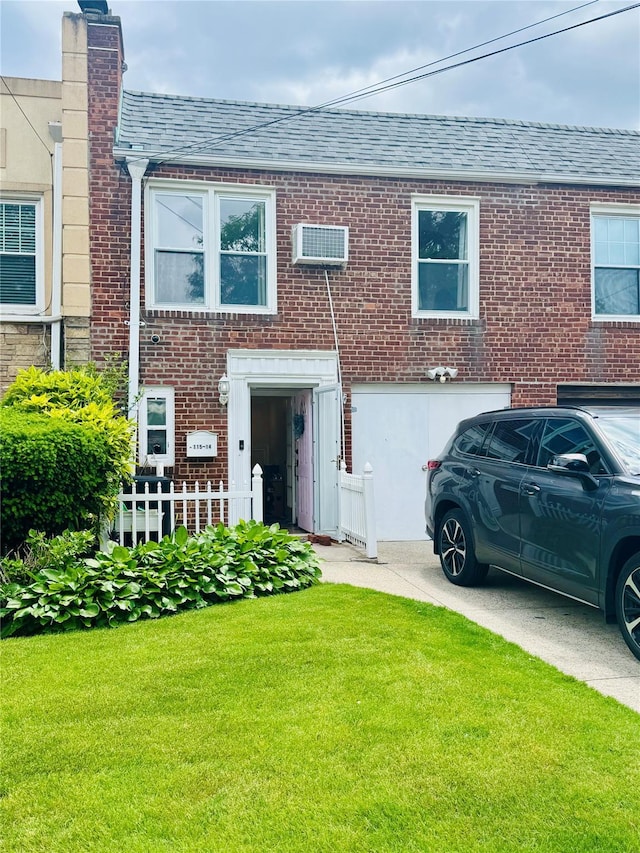 11514 135th Ave, Ozone Park, NY 11420 - view of front of property featuring a shingled roof, a front yard, a chimney, and brick siding