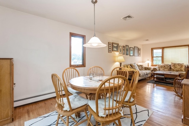 18 Norwood Pl, Nanuet, NY 10954 - dining space featuring a baseboard radiator and light wood-type flooring