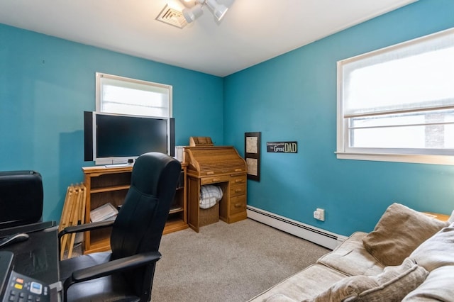 18 Norwood Pl, Nanuet, NY 10954 - home office featuring baseboard heating, plenty of natural light, and carpet