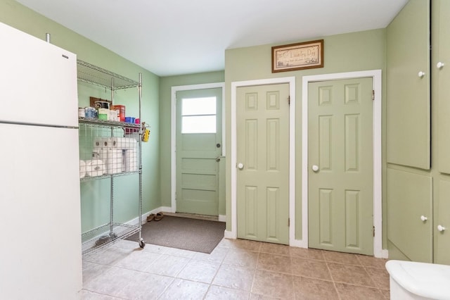 18 Norwood Pl, Nanuet, NY 10954 - entryway with light tile patterned flooring and baseboards