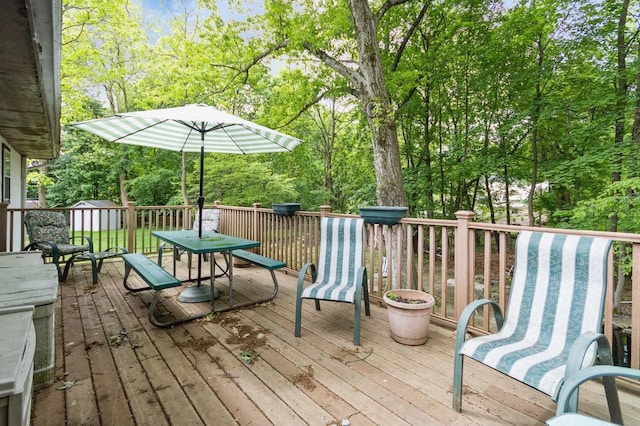 18 Norwood Pl, Nanuet, NY 10954 - wooden terrace with outdoor dining area and view of scattered trees