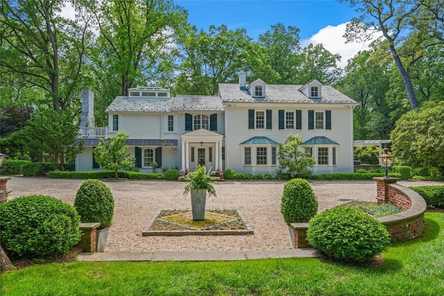161 Piping Rock Rd, Locust Valley, NY 11560 - view of front facade with a chimney