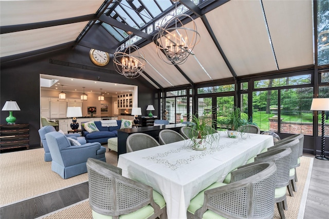 161 Piping Rock Rd, Locust Valley, NY 11560 - sunroom with a chandelier and vaulted ceiling