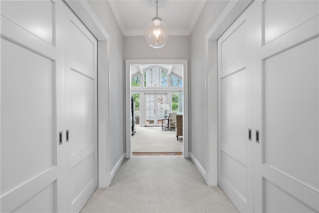 161 Piping Rock Rd, Locust Valley, NY 11560 - hallway with light colored carpet, crown molding, and baseboards