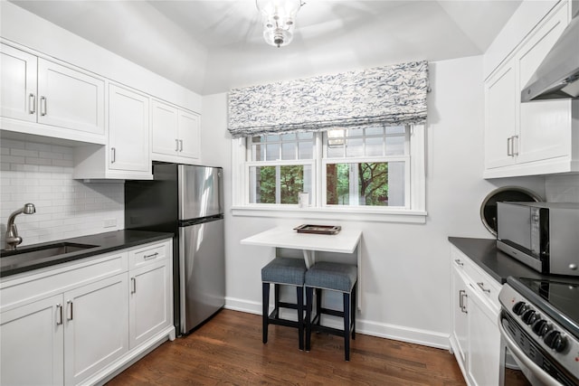 161 Piping Rock Rd, Locust Valley, NY 11560 - kitchen with a sink, appliances with stainless steel finishes, range hood, and dark countertops