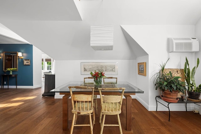 38 Oliphant Ave Unit 6, Dobbs Ferry, NY 10522 - dining room with a wall mounted AC, dark wood-style flooring, baseboards, and lofted ceiling