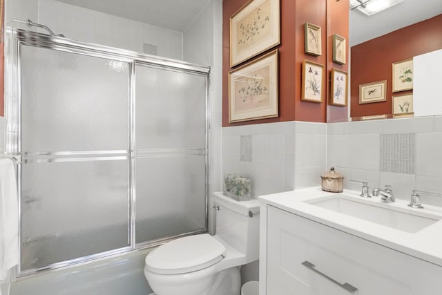 38 Oliphant Ave Unit 6, Dobbs Ferry, NY 10522 - bathroom with toilet, tile walls, and vanity