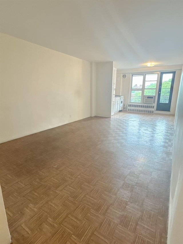 35-11 85th St Unit 6A, Jackson Heights, NY 11756 - spare room featuring radiator heating unit
