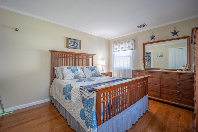 216 Hickory Hill Ln, Newburgh, NY 12550 - bedroom with wood finished floors, ornamental molding, and baseboards