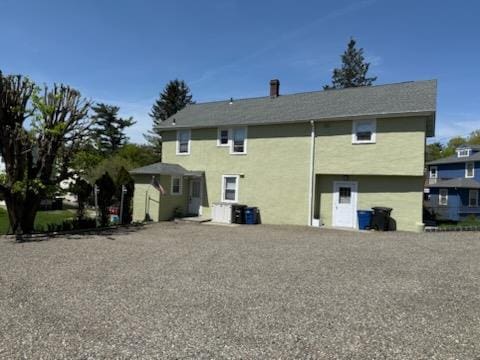 86 E Sunnyside Ln, Irvington, NY 10533 - back of property with stucco siding