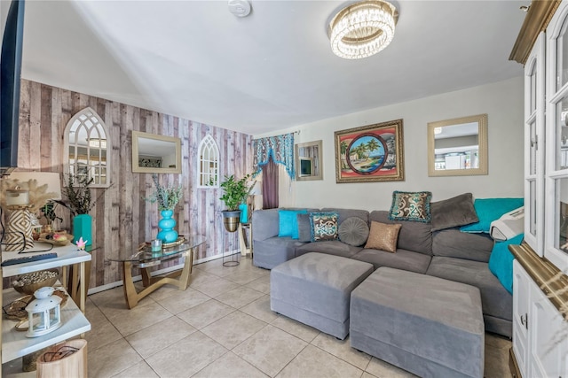 654 Long Island Ave, Deer Park, NY 11729 - living room with wood walls, baseboards, and light tile patterned floors