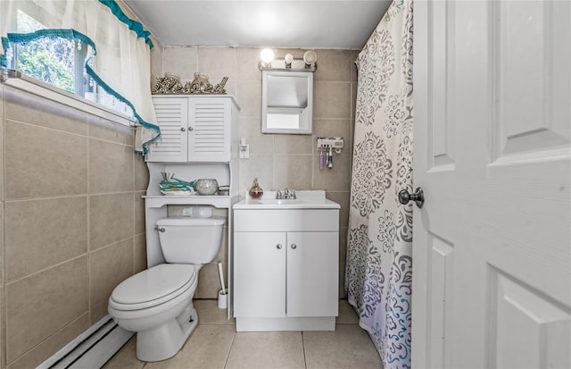 654 Long Island Ave, Deer Park, NY 11729 - bathroom featuring a baseboard heating unit, tile patterned floors, tile walls, toilet, and vanity