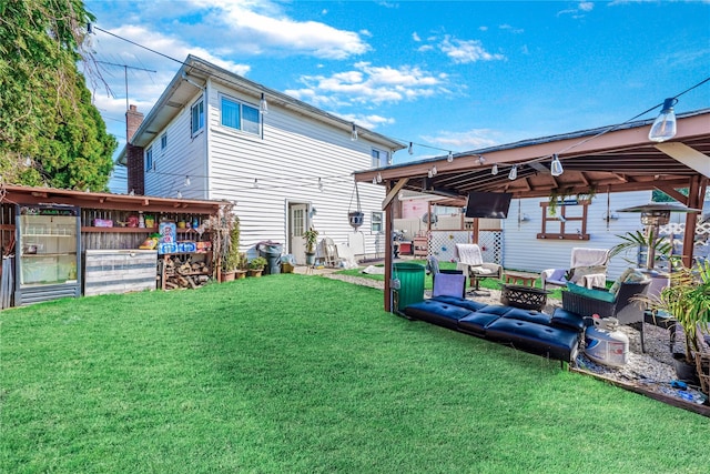 654 Long Island Ave, Deer Park, NY 11729 - back of property featuring a gazebo, a yard, and an outdoor fire pit
