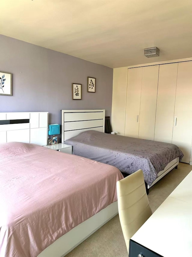 134-54 Maple Ave Unit 3V, Flushing, NY 11355 - carpeted bedroom featuring a closet