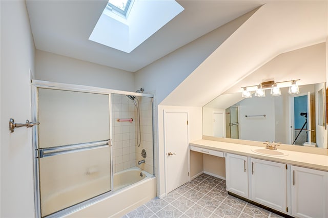 53 Mystic Cir, Bay Shore, NY 11706 - bathroom with a skylight, bath / shower combo with glass door, vanity, and lofted ceiling