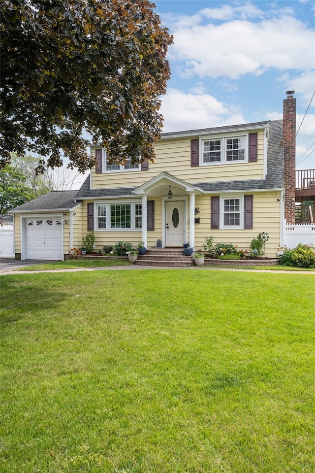 1547 Lincoln Blvd, Bay Shore, NY 11706 - view of front of house with an attached garage, a chimney, a shingled roof, and driveway