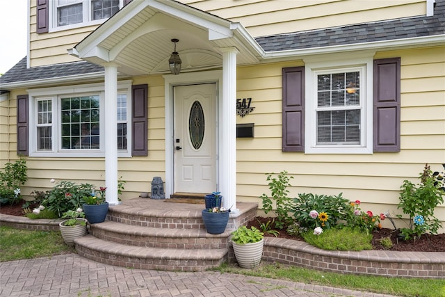 1547 Lincoln Blvd, Bay Shore, NY 11706 - property entrance with roof with shingles