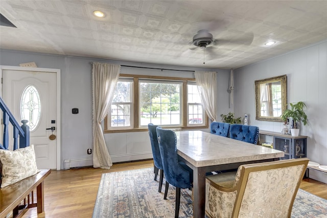 1547 Lincoln Blvd, Bay Shore, NY 11706 - dining area featuring plenty of natural light, light wood-type flooring, and an ornate ceiling