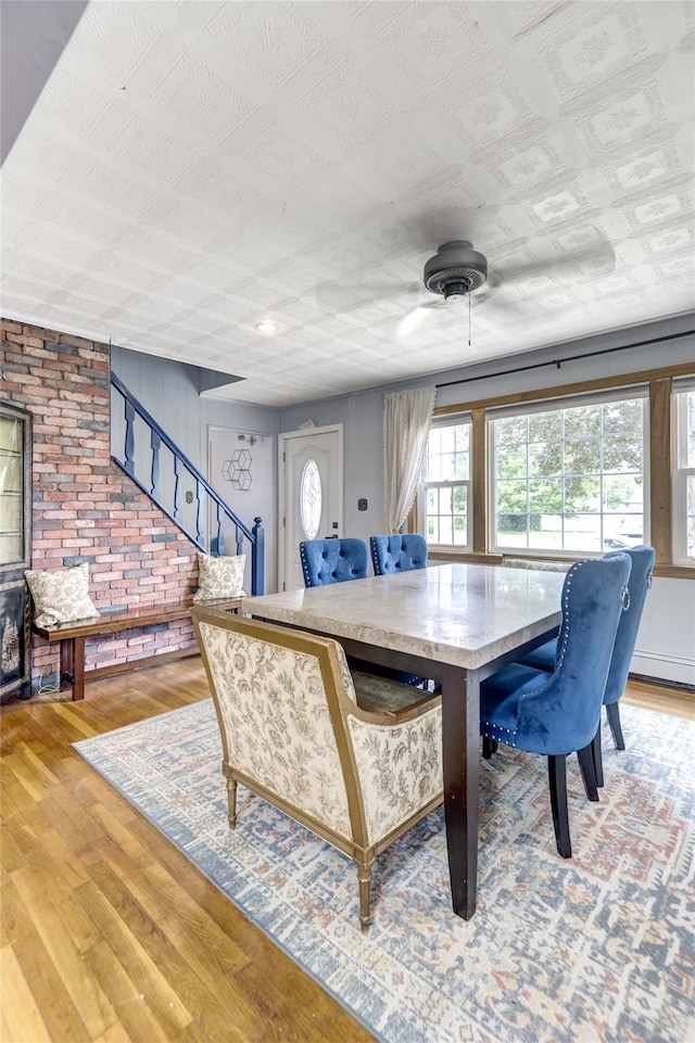 1547 Lincoln Blvd, Bay Shore, NY 11706 - dining room featuring light wood finished floors and stairs