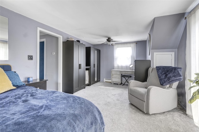 1547 Lincoln Blvd, Bay Shore, NY 11706 - bedroom with light colored carpet, ceiling fan, and baseboard heating