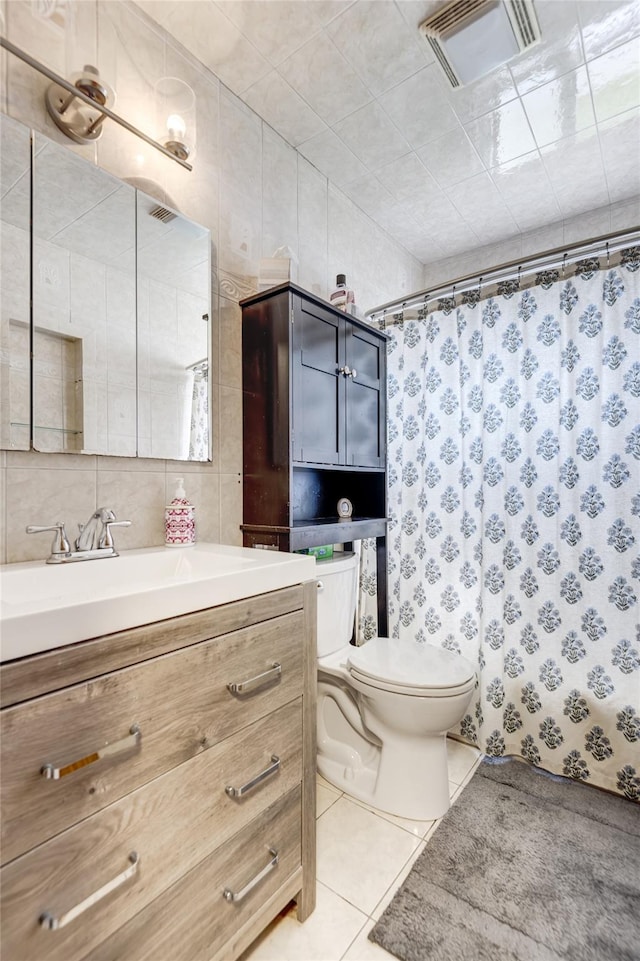 1547 Lincoln Blvd, Bay Shore, NY 11706 - full bathroom with vanity, toilet, tile patterned floors, and a shower with shower curtain