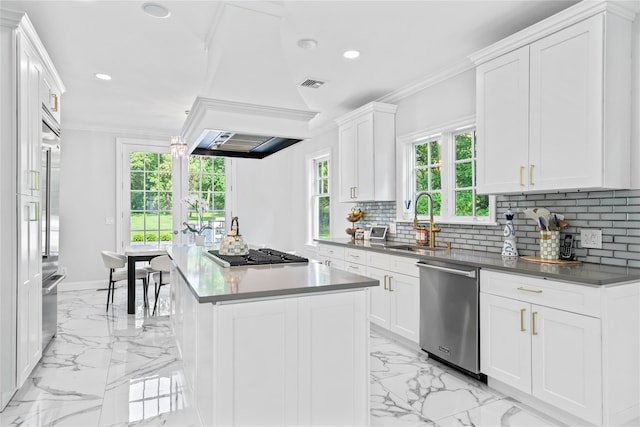 178 High Farms Rd, Old Brookville, NY 11545 - kitchen featuring appliances with stainless steel finishes, light marble finish flooring, backsplash, ornamental molding, and white cabinets
