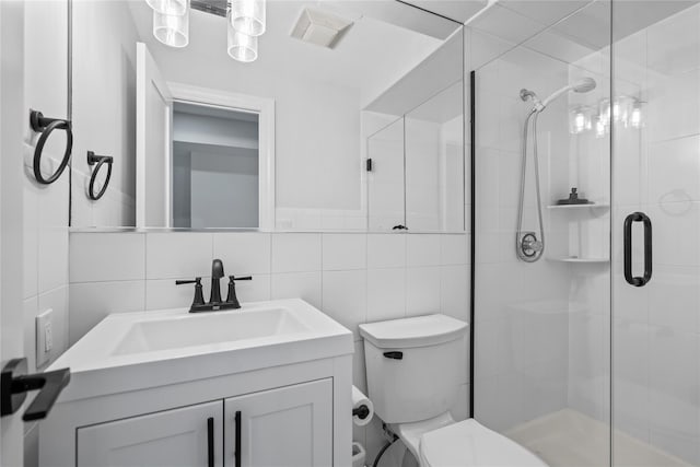 178 High Farms Rd, Old Brookville, NY 11545 - bathroom featuring vanity, a shower stall, and tile walls