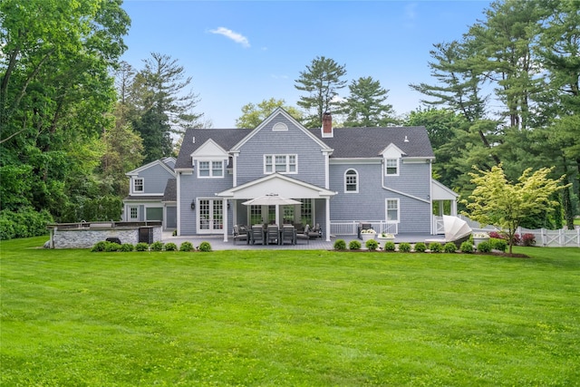 178 High Farms Rd, Old Brookville, NY 11545 - back of property featuring a patio area, a chimney, and view of wooded area