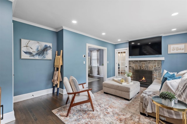 10 Mcbride Ave, White Plains, NY 10603 - living room with wood finished floors, recessed lighting, crown molding, a stone fireplace, and baseboards