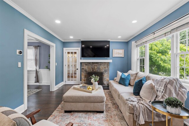 10 Mcbride Ave, White Plains, NY 10603 - living area with recessed lighting, crown molding, baseboards, wood finished floors, and a fireplace