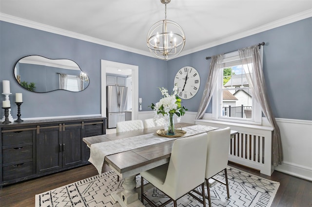 10 Mcbride Ave, White Plains, NY 10603 - dining space featuring a chandelier, ornamental molding, dark wood finished floors, and a wainscoted wall