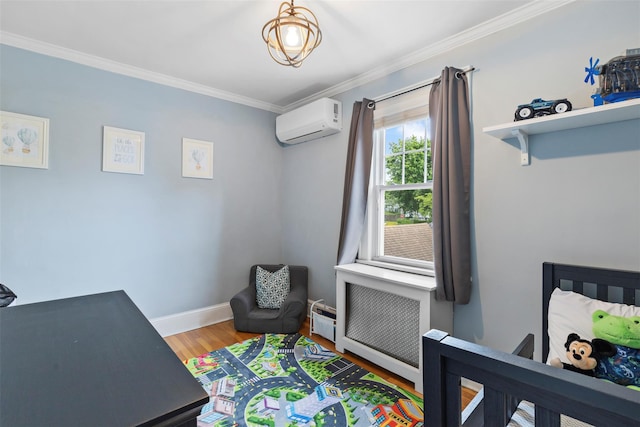10 Mcbride Ave, White Plains, NY 10603 - bedroom featuring a wall mounted AC, ornamental molding, wood finished floors, radiator heating unit, and baseboards