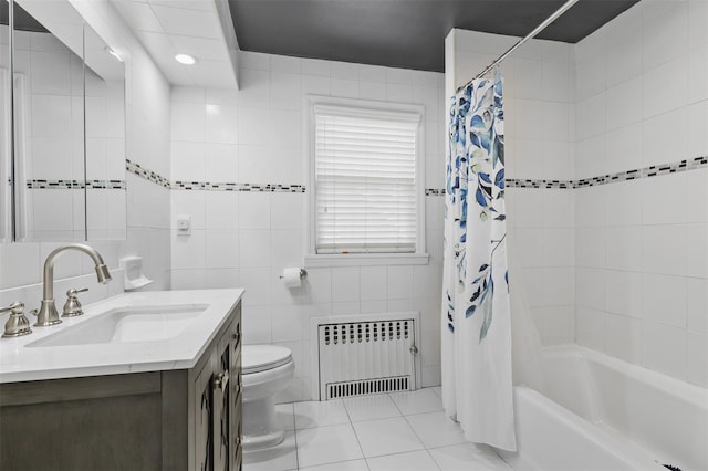 10 Mcbride Ave, White Plains, NY 10603 - full bathroom featuring radiator, vanity, toilet, shower / bath combo, and tile patterned floors