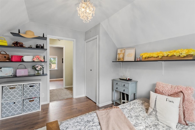 10 Mcbride Ave, White Plains, NY 10603 - bedroom featuring lofted ceiling, wood finished floors, a chandelier, baseboards, and a closet