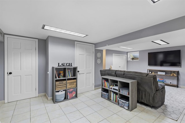 10 Mcbride Ave, White Plains, NY 10603 - living area with baseboards and light tile patterned floors