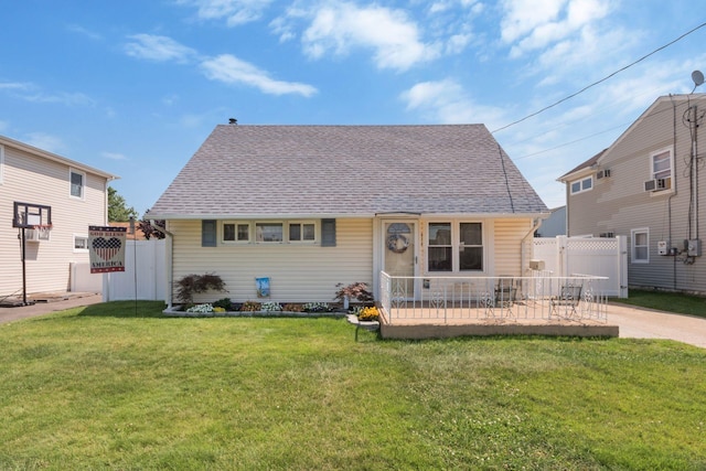 820 Mirabelle Ave, Westbury, NY 11590 - view of front facade with a patio area, cooling unit, and a shingled roof