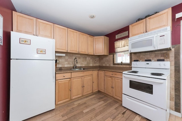 820 Mirabelle Ave, Westbury, NY 11590 - kitchen featuring white appliances, light brown cabinetry, and light wood finished floors