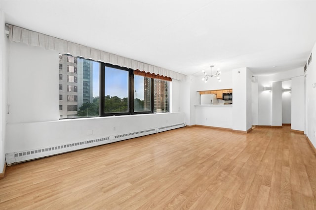 4 Martine Ave Unit 416, White Plains, NY 10606 - unfurnished living room with a chandelier, baseboard heating, light wood-style floors, and baseboards