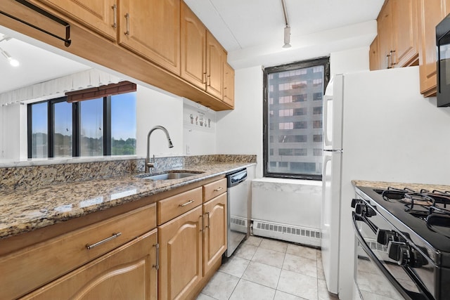 4 Martine Ave Unit 416, White Plains, NY 10606 - kitchen featuring a sink, a baseboard radiator, gas stove, stainless steel dishwasher, and light stone counters