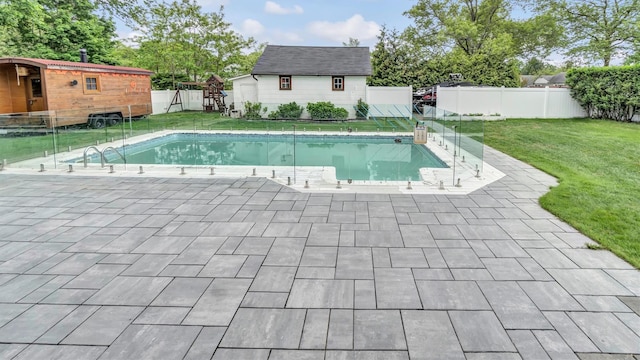 143 Hallock St, Riverhead, NY 11901 - view of swimming pool featuring a patio and an outdoor structure