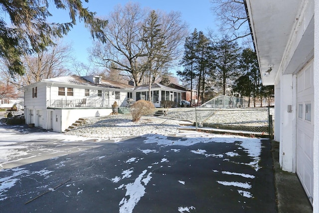 10 Glenbrook Rd, Monsey, NY 10952 - view of front of house featuring covered porch, stairway, and an attached garage